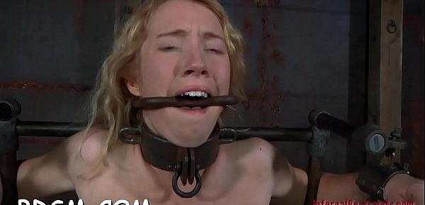  Restrained cutie is made to suffer below hard toy playing